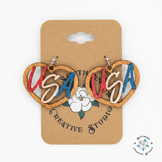 USA Heart Earrings on Southern Creative Studio wood card – hand-painted red white and blue glitter