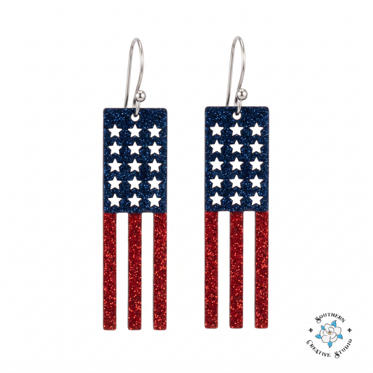 USA flag fringe hand-painted wood earrings with star cutouts on white background
