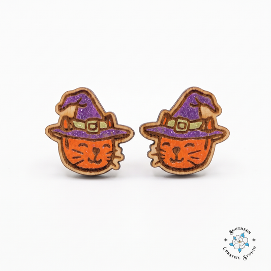 Witch cat stud earrings – orange cat in purple witch hat, hand-painted wood