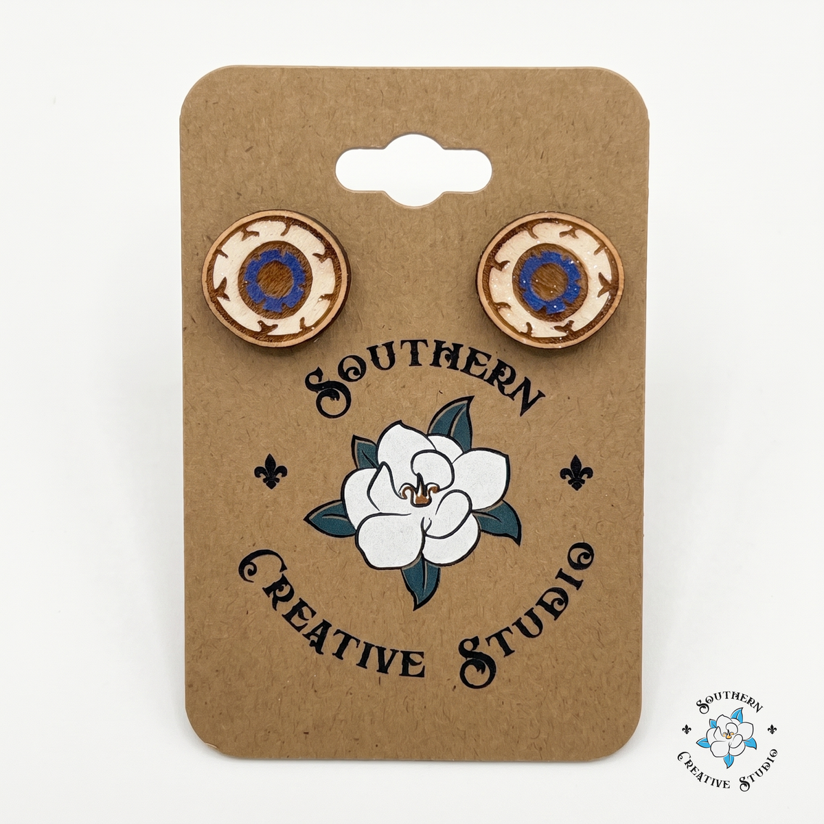 Creepy cute wood eyeball stud earrings on Southern Creative Studio magnolia card
