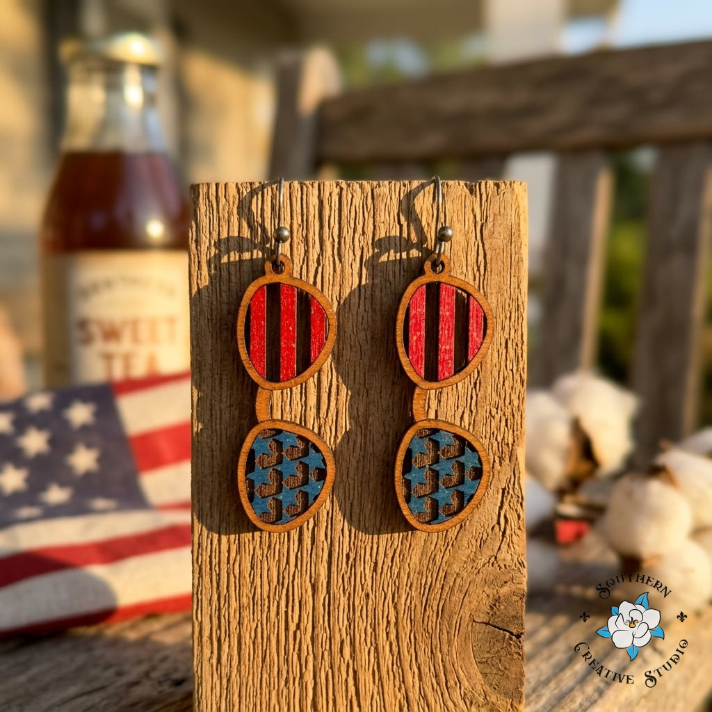 USA Flag Sunglasses Earrings flat lay – patriotic statement jewelry