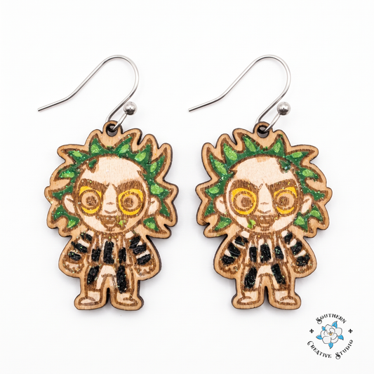 Hand-painted wood green-haired striped suit ghoul dangle earrings on white background