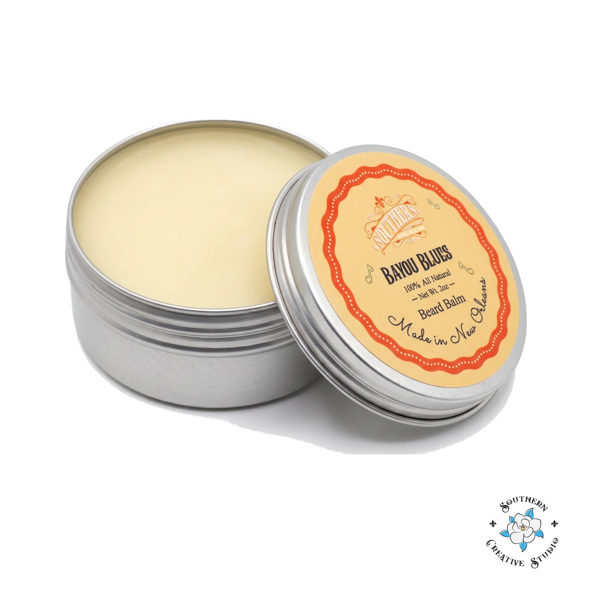 Southern Creative Studio Bayou Blues beard balm, open 2 oz tin with lid on white background