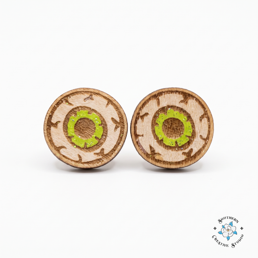 Green eyeball stud earrings, hand-painted wood, on white background