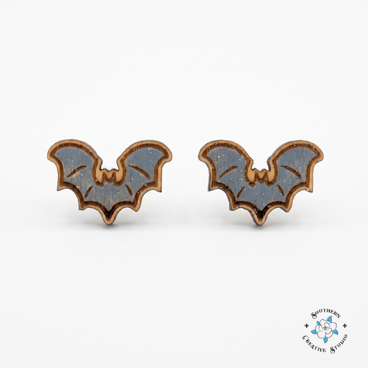 Gray bat wood stud earrings, hand-painted, on white background