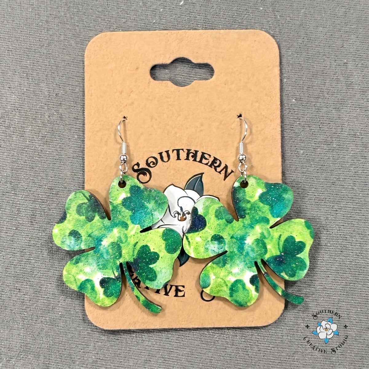 Marbled four leaf clover earrings on a Southern Creative Studio earring card