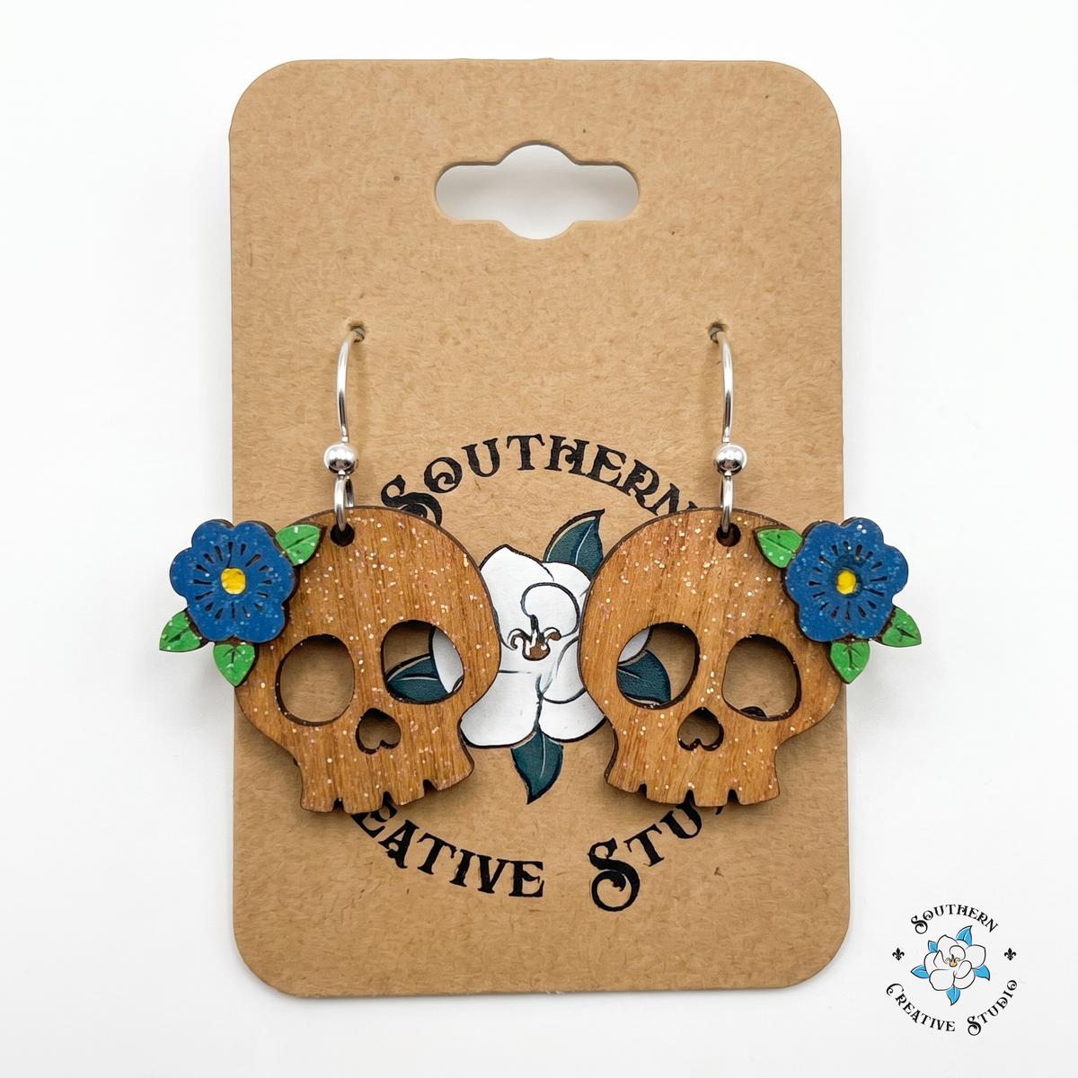 Floral skull wood earrings on Southern Creative Studio magnolia card