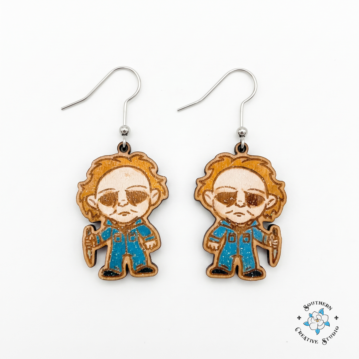Masked slasher chibi hand-painted wood dangle earrings on white background