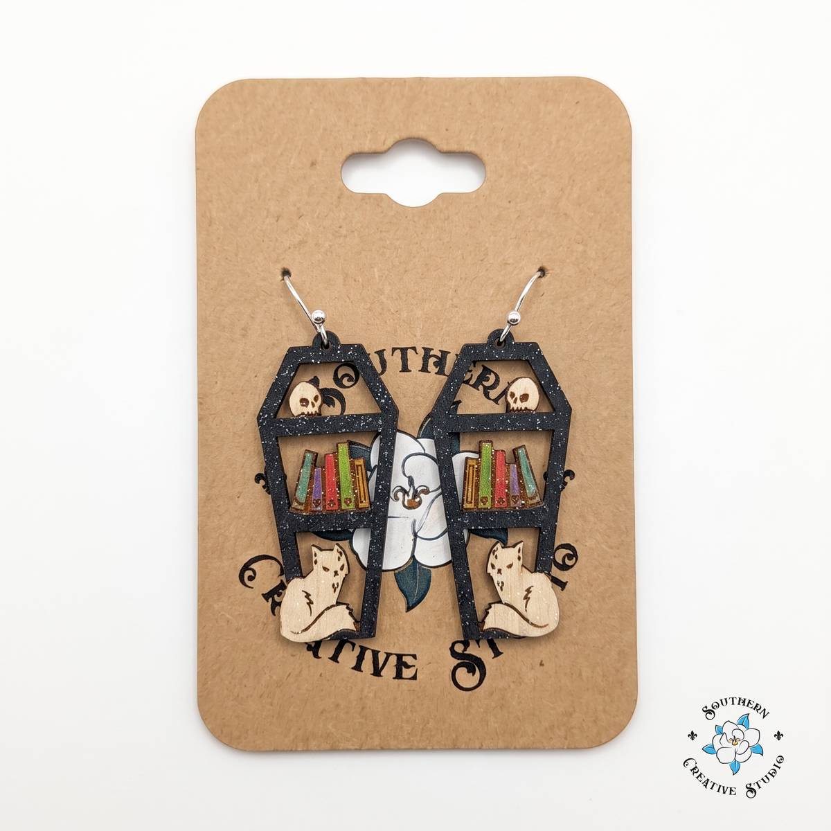 Gothic coffin bookshelf wood earrings on Southern Creative Studio magnolia card