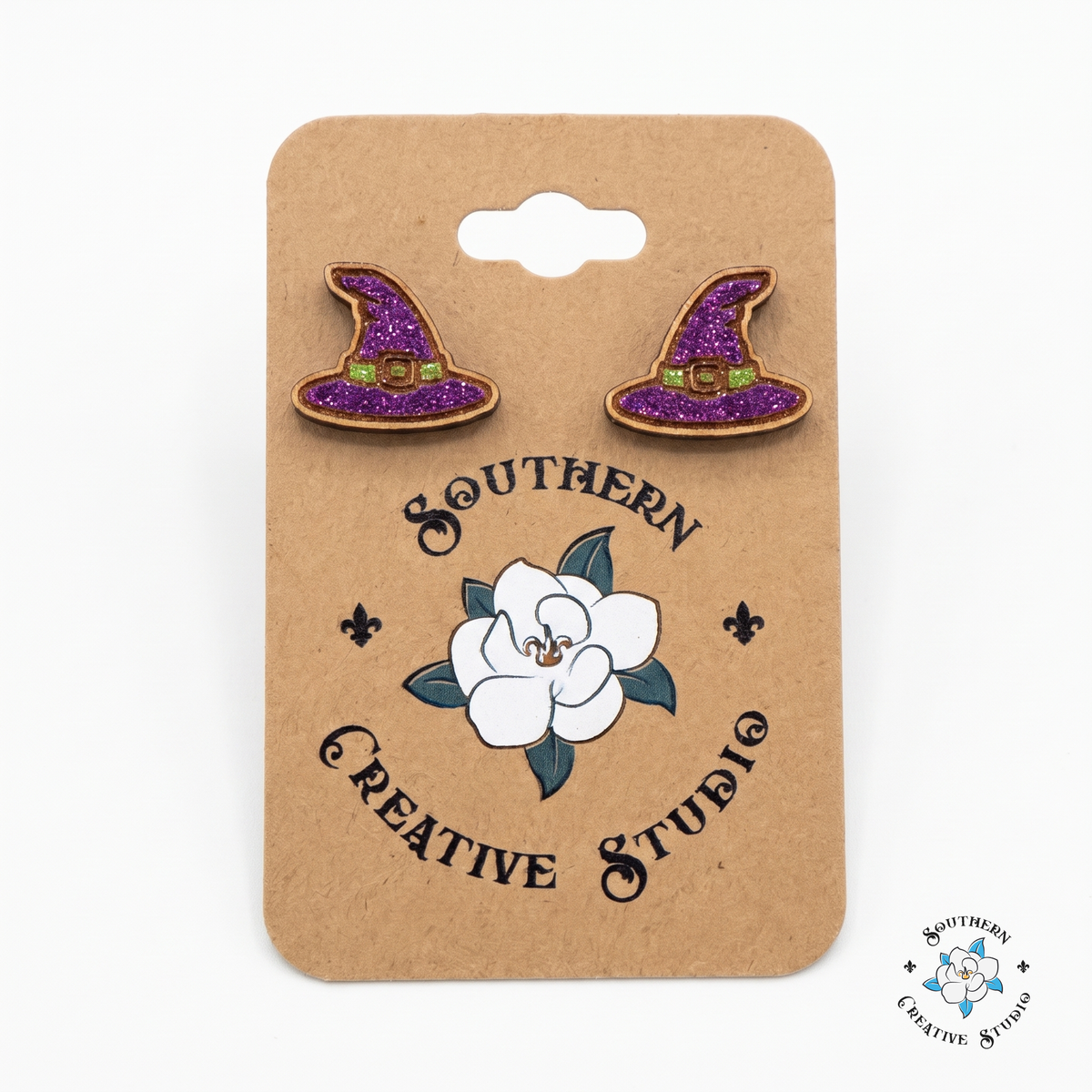 Purple witch hat wood stud earrings on Southern Creative Studio hang card