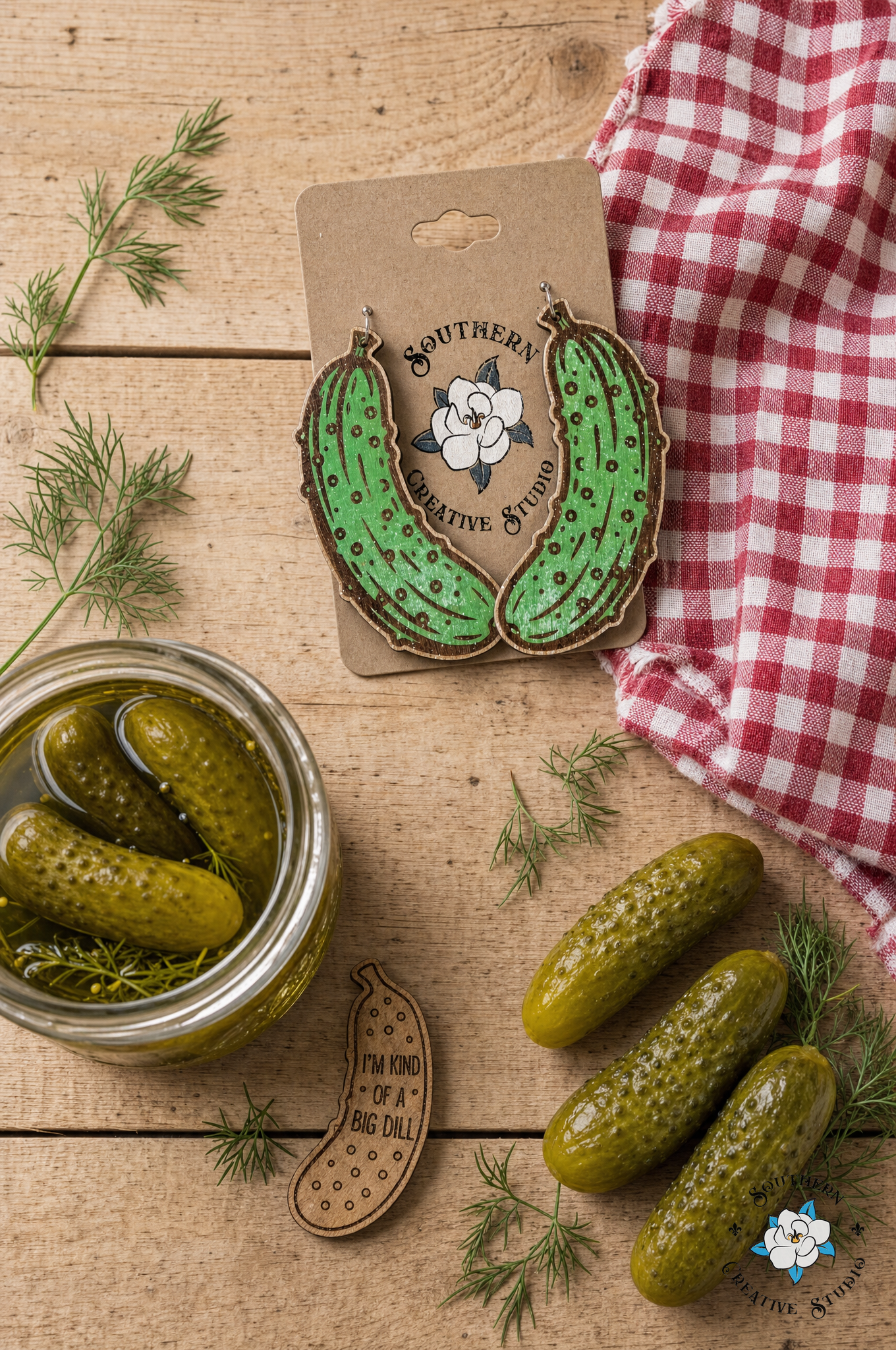 Dill pickle earrings flat lay – bold handmade gift for pickle lovers