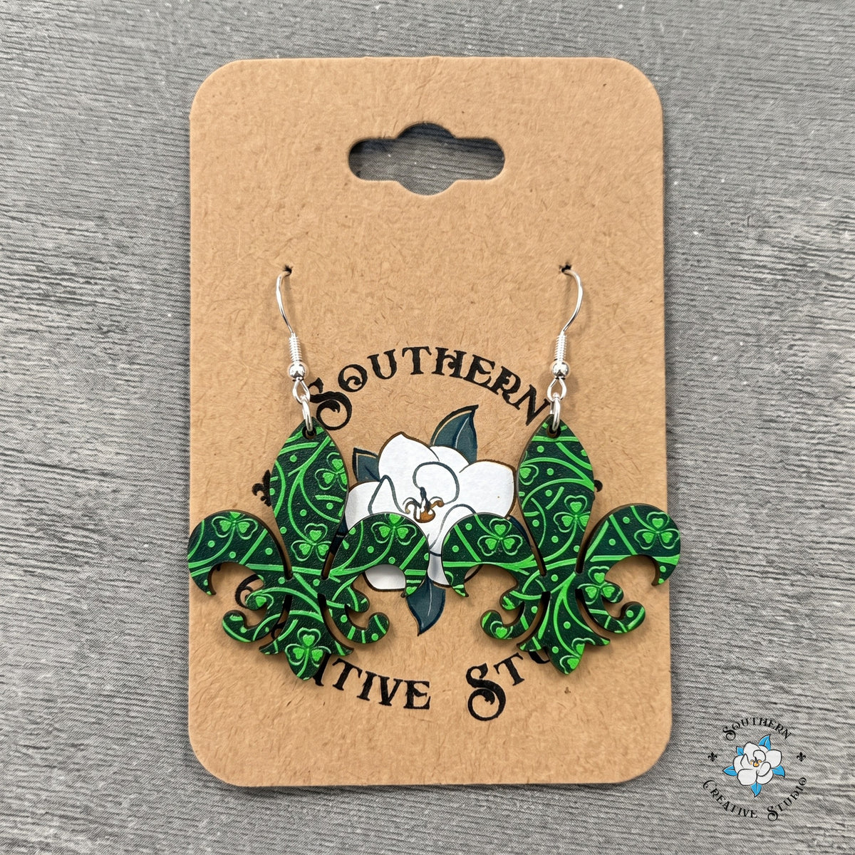 Celtic knot fleur-de-lis earrings on a Southern Creative Studio earring card