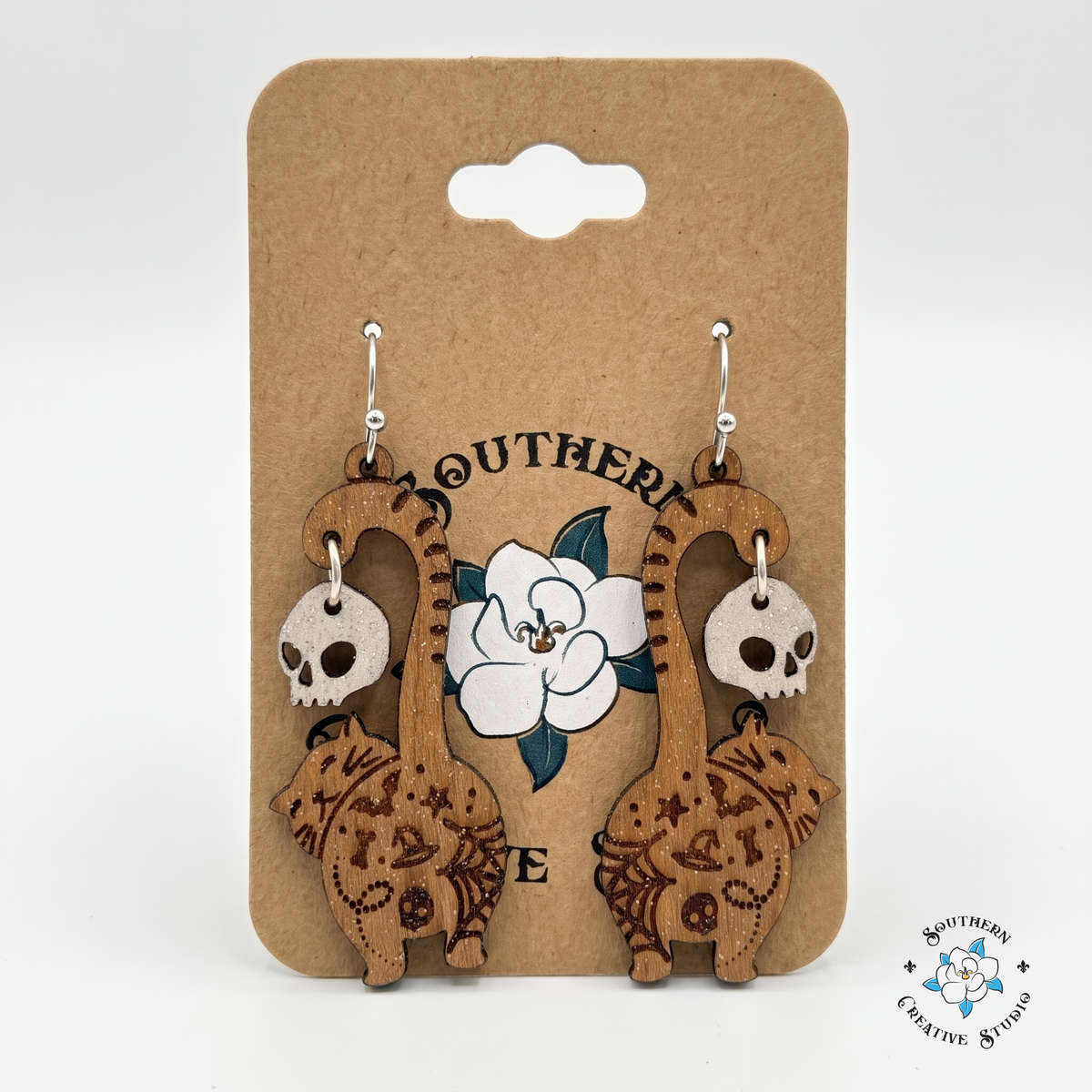 Spooky cat butt earrings on Southern Creative Studio magnolia hang card