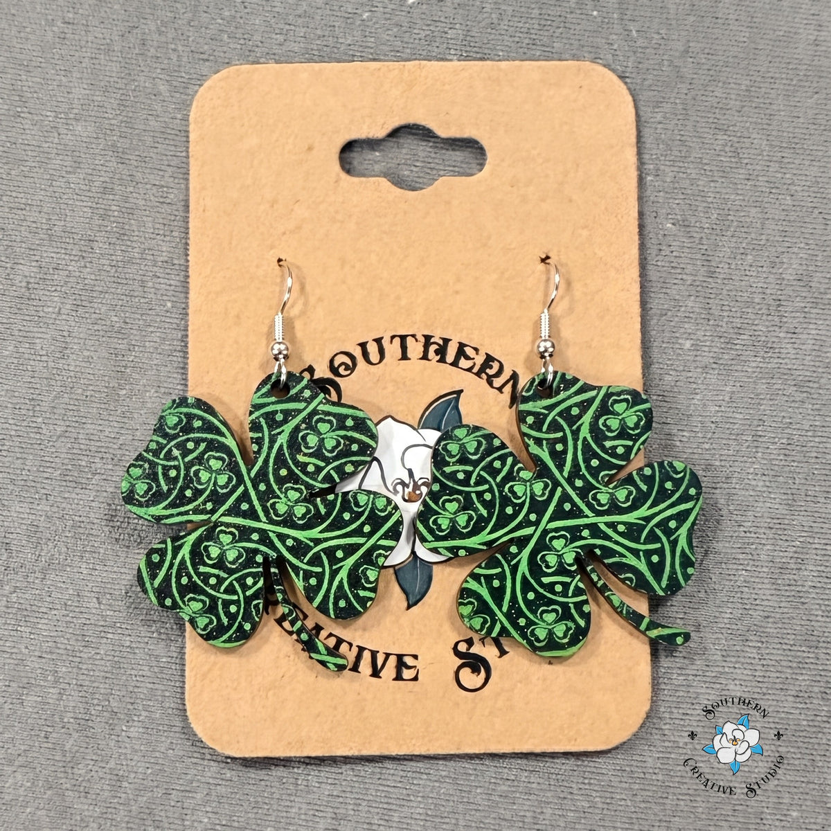 Celtic knot clover earrings on a Southern Creative Studio earring card