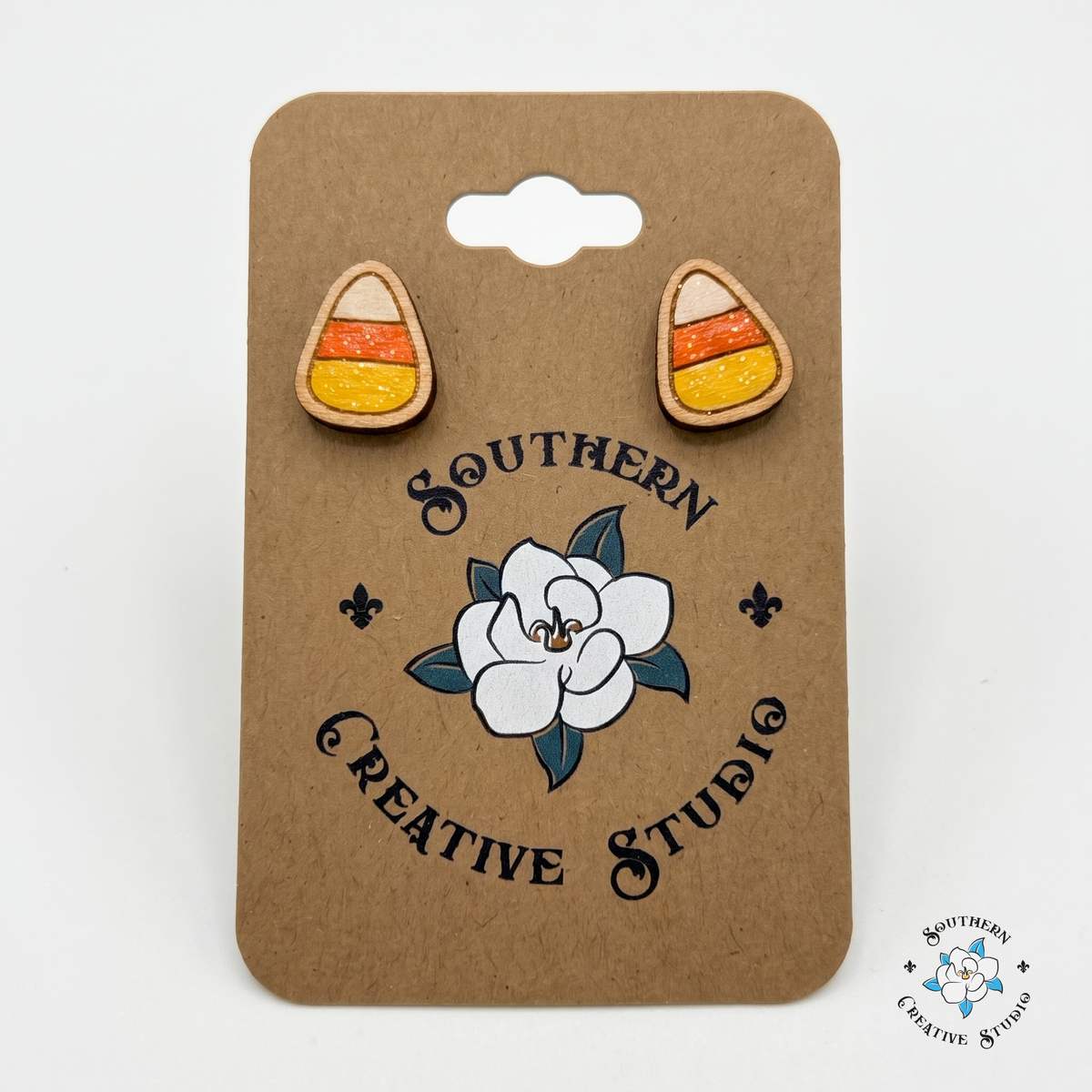 Candy corn stud earrings on Southern Creative Studio magnolia hang card