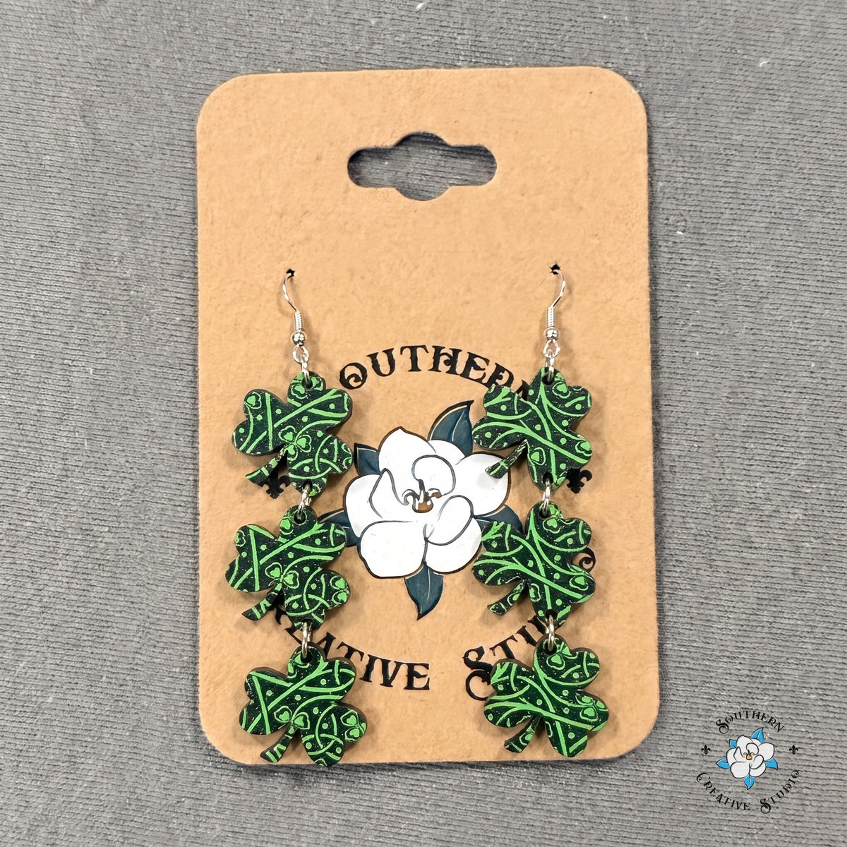 Celtic knot shamrock dangle earrings on a Southern Creative Studio earring card