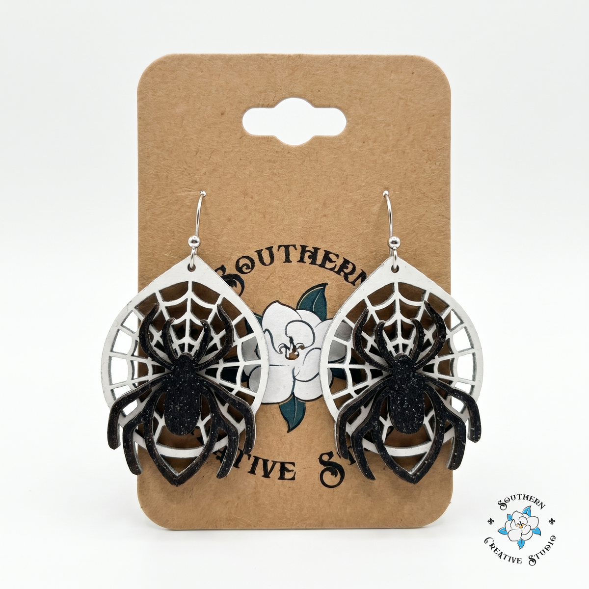 Spider web wood earrings on Southern Creative Studio hang card
