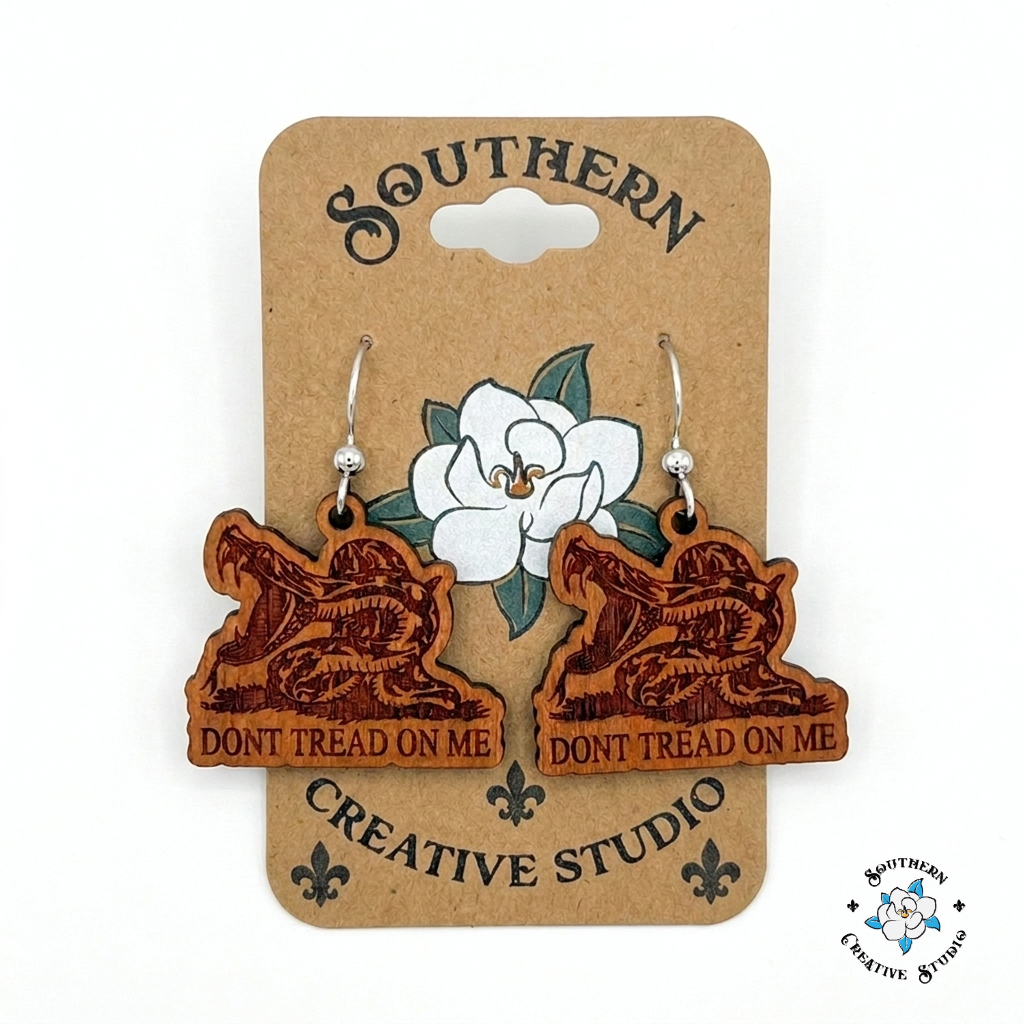 Don't Tread On Me Snake Earrings on Southern Creative Studio wood card – hand-painted engraved wood