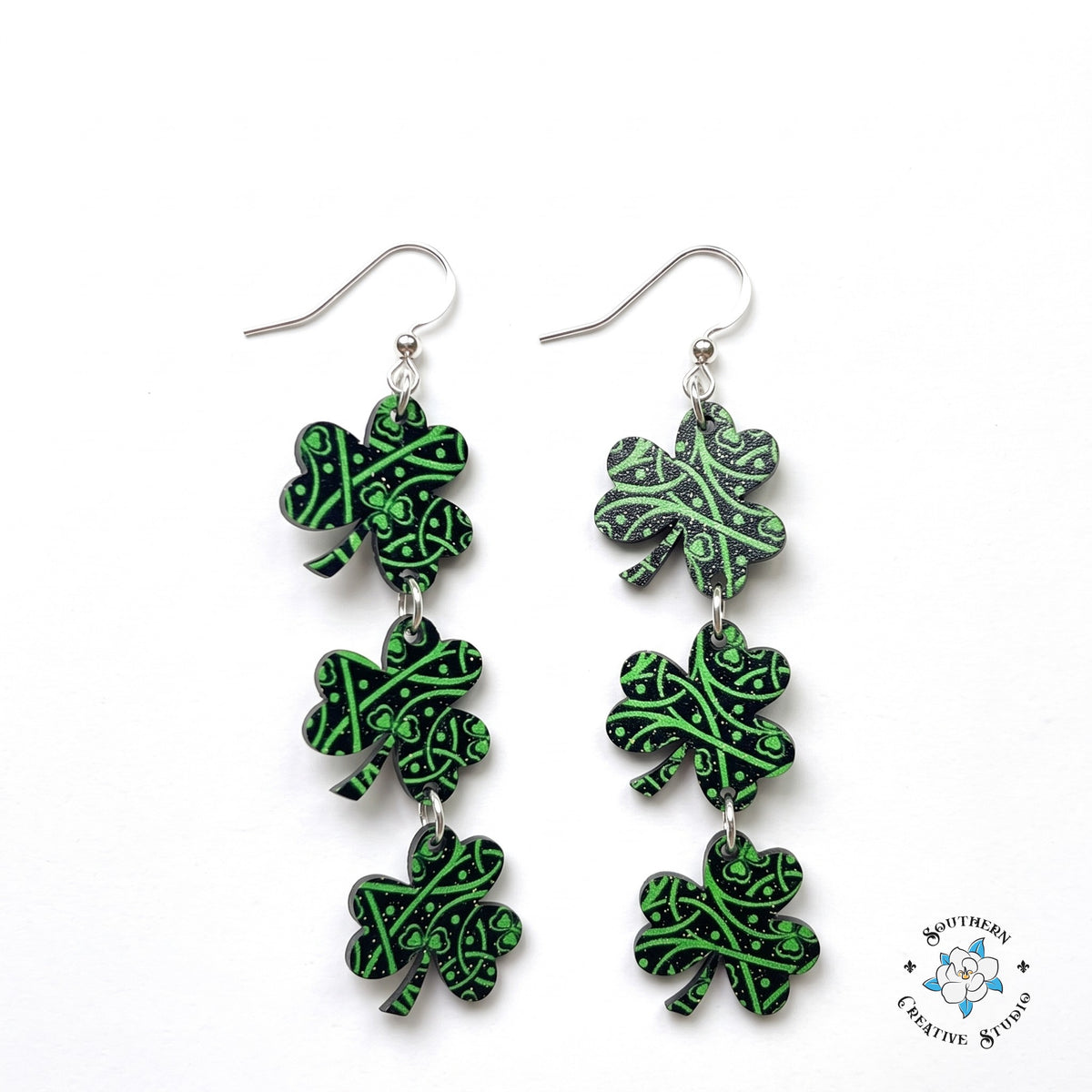 St. Patrick's Celtic knot three leaf clover triple dangle earrings on white