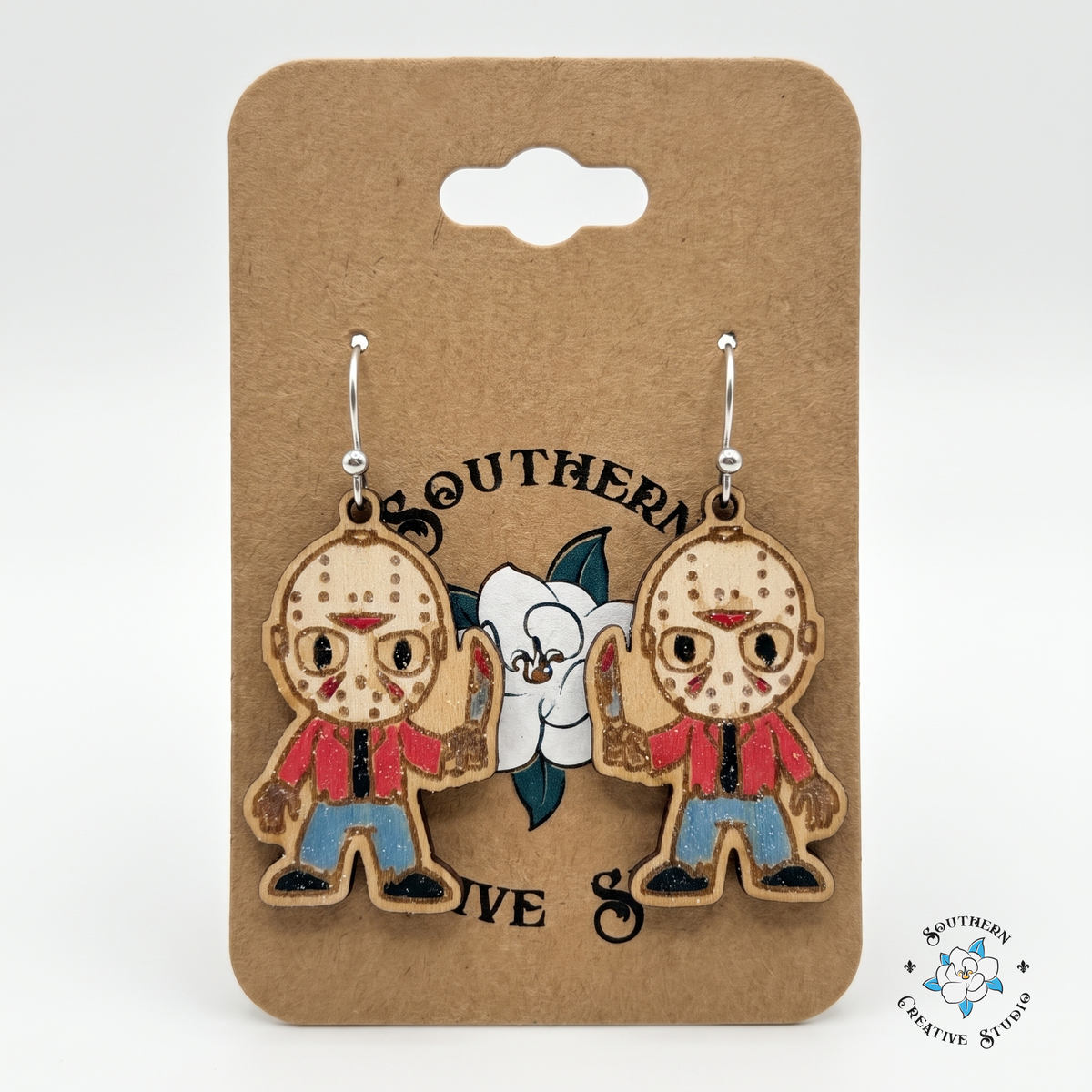 Hockey mask slasher earrings on Southern Creative Studio magnolia hang card