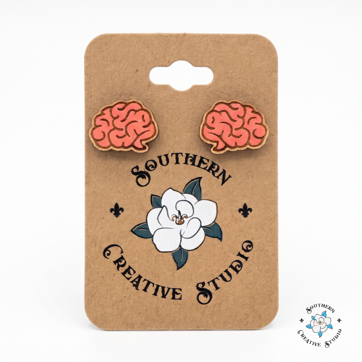 Pink brain wood stud earrings on Southern Creative Studio hang card