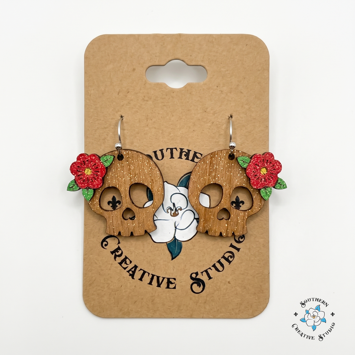 Red rose skull wood earrings on Southern Creative Studio magnolia card